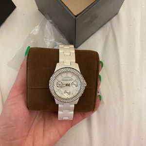 Michael Kors watch . There are some stain on links
